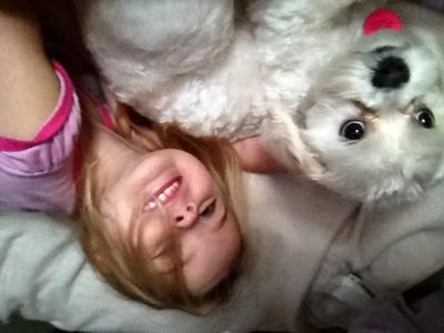 My youngest cuddling with Bailey on day 2 with us. 